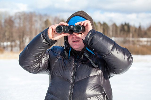 Stock photograph of man in cold weather clothes by Kekyalyaynen/Shutterstock